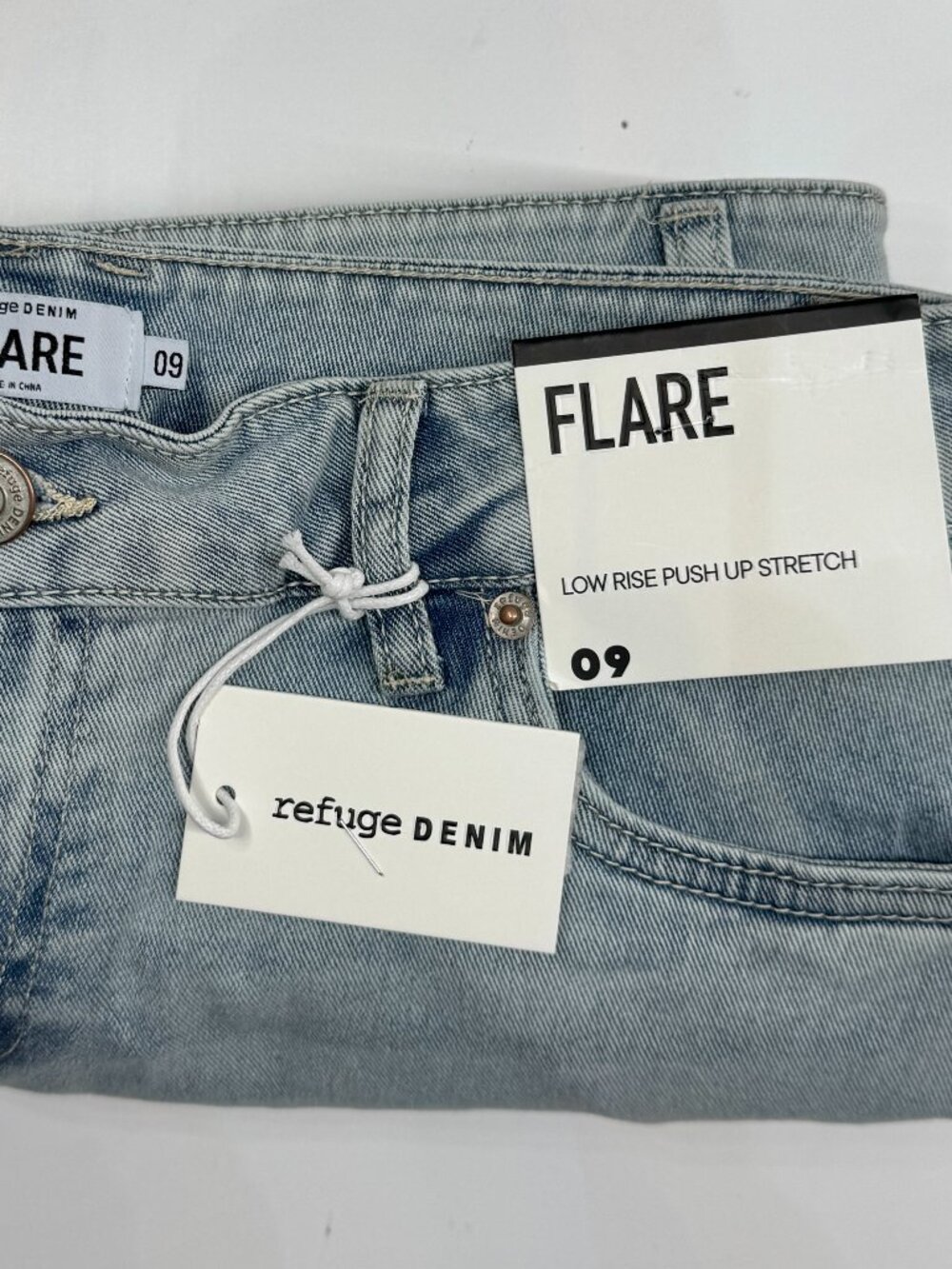 Refuge Denim light-wash flare jeans w/raw-edge Size 9